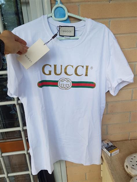 maglia bianca gucci con strisce verdi e rosse orizzontali|Abiti in Maglia Eleganti .